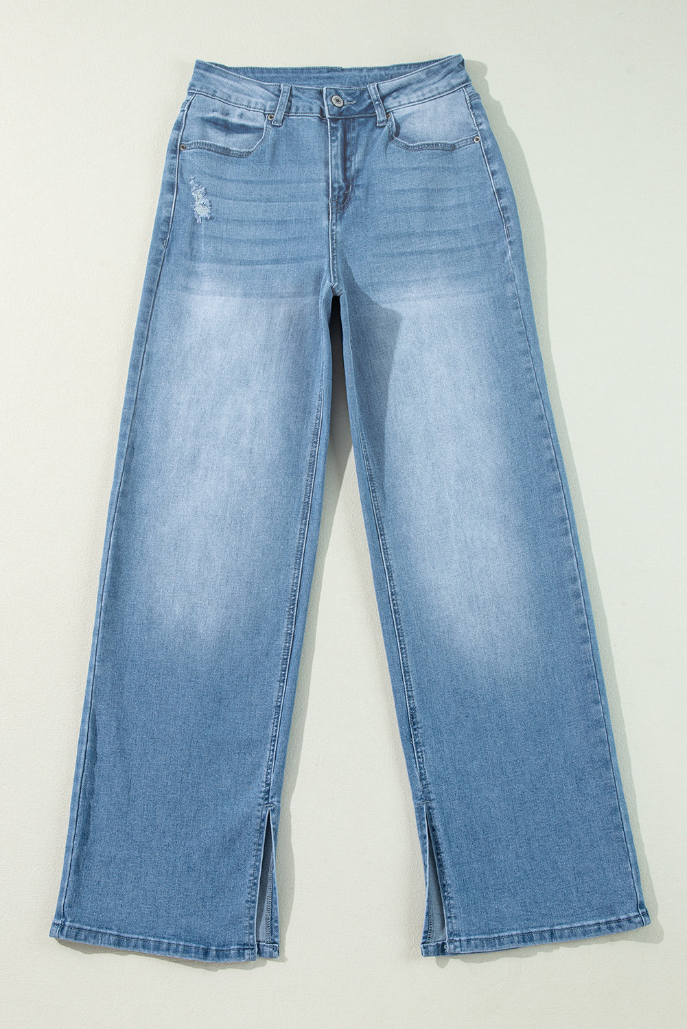 Elevate your look with High Rise Slit Leg Straight Jeans in light wash. Flattering fit, vintage charm, and all-day comfort.